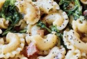 Curly pasta, arugula, pancetta, ina creamy cheese sauce dotted with pepper