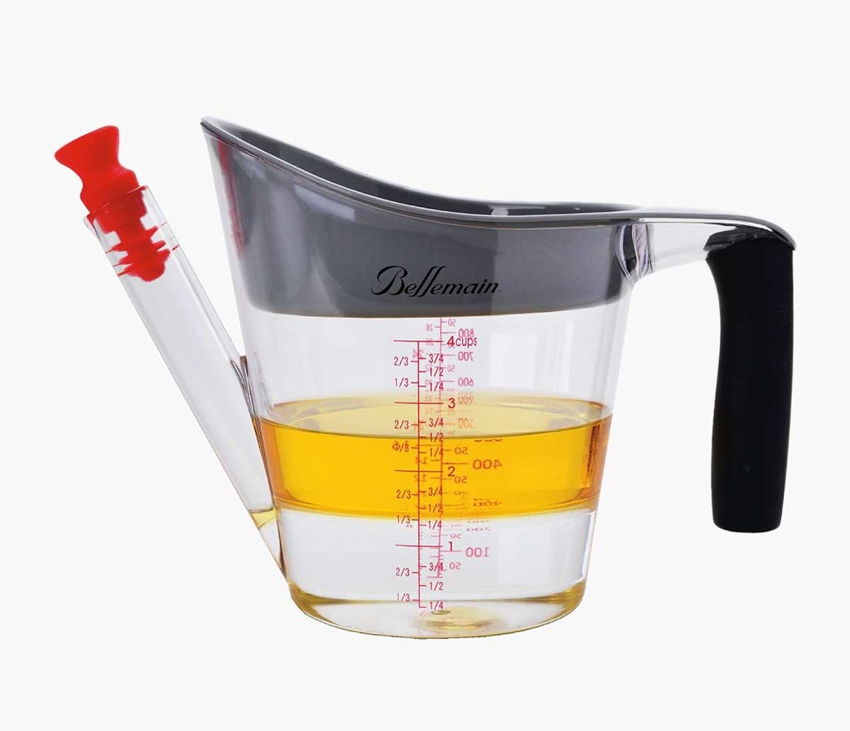 Fat Separator and Measuring Cup shown with water and oil in it.