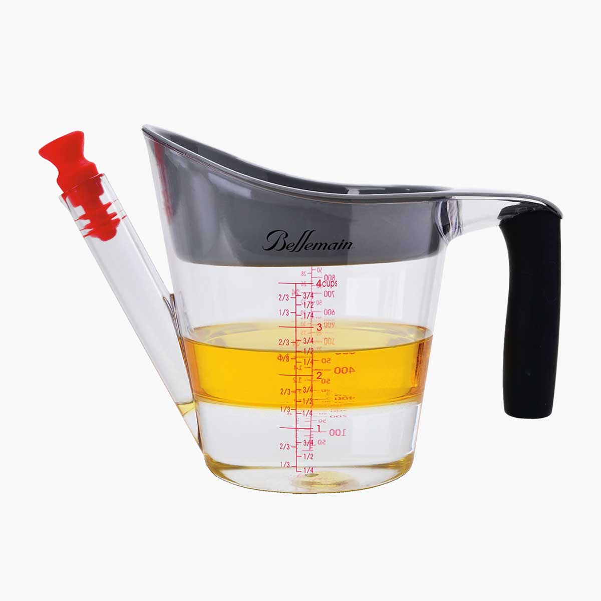 Fat Separator and Measuring Cup shown with water and oil in it.