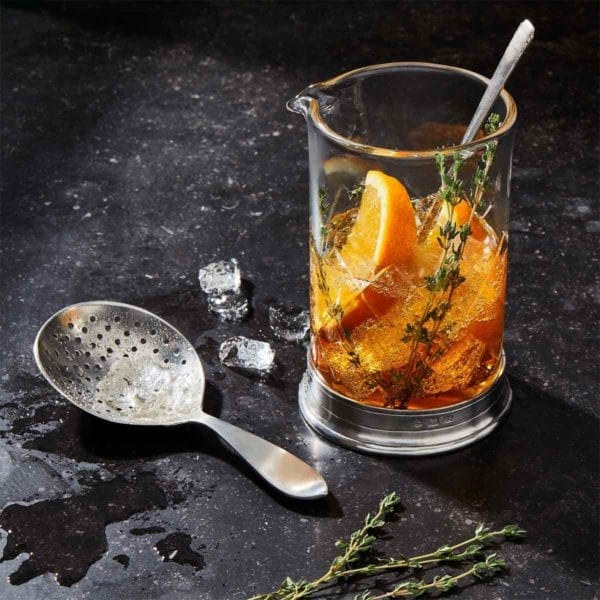Match Cocktail Mixing Glass with thyme orange and bourbon.