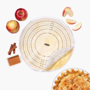 OXO Good Grips Silicone Dough Rolling Bag pictured with apple pie in bottom right corner.