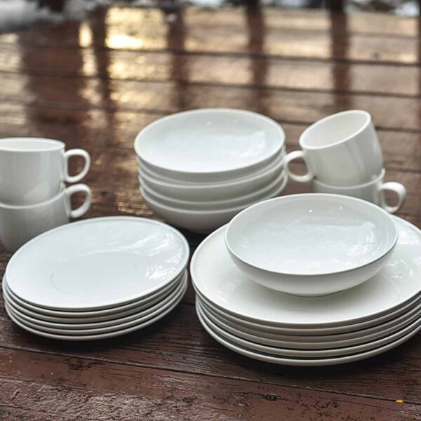 Set of Red Vanilla White Dinnerware with mugs.