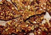 Irregular pieces of pistachio brittle.