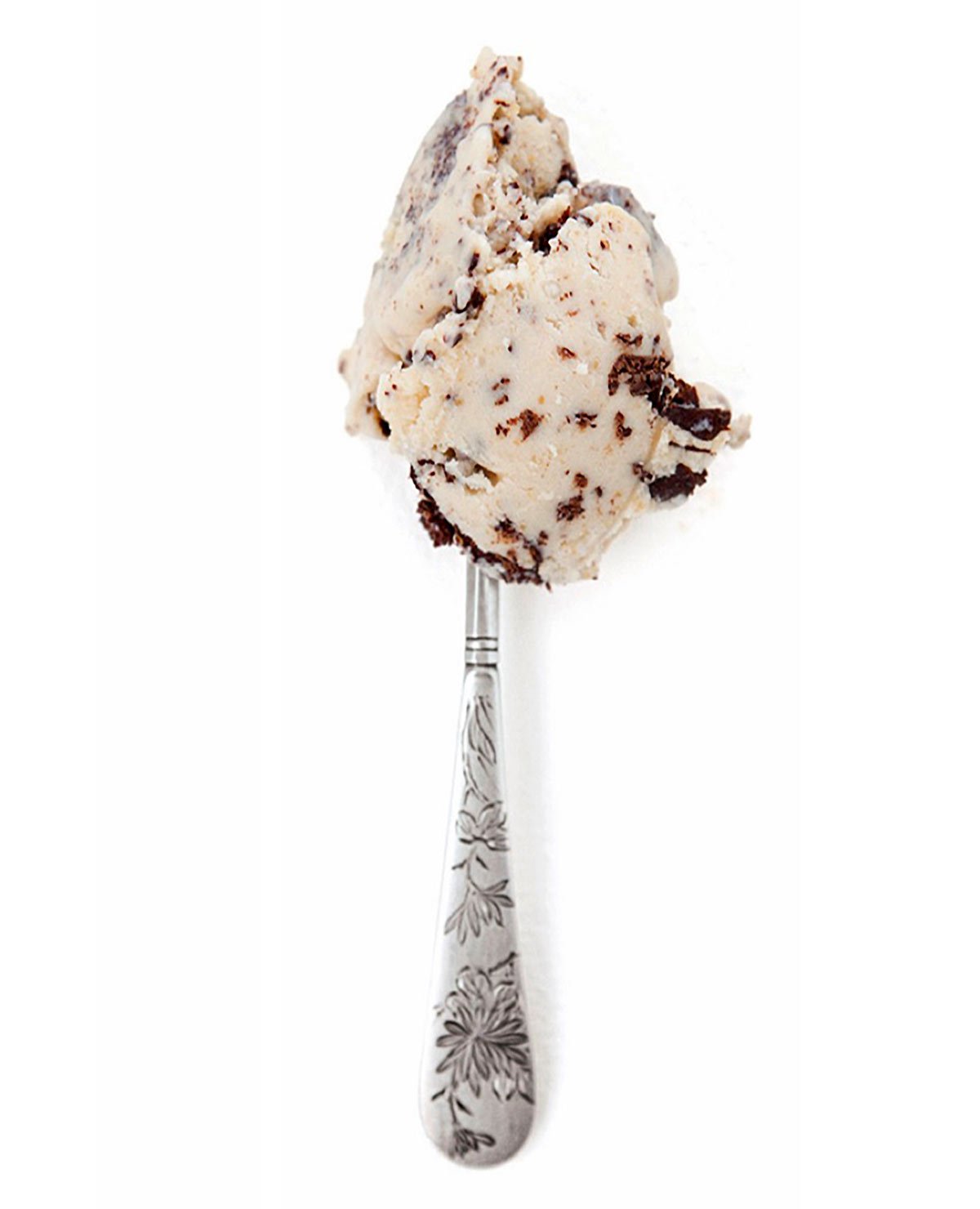 A scoop of salted peanut butter ice cream with chocolate flecks on a silver spoon.