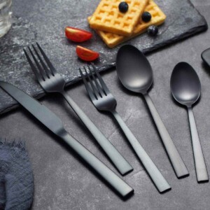 Titanium Flatware on table with waffles above.