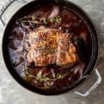Braised pork with red wine sauce in a Staub Dutch oven.
