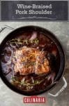 Braised pork with red wine sauce in a Staub Dutch oven.