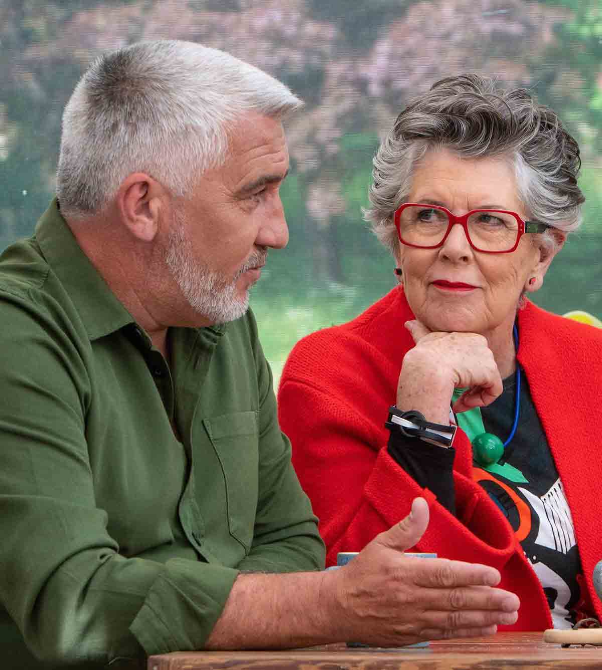 An image of Paul Hollywood and Prue Leith on the set of the Great British Bake Off.
