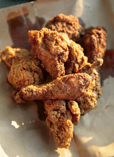 A pile of Cajun fried chicken pieces.