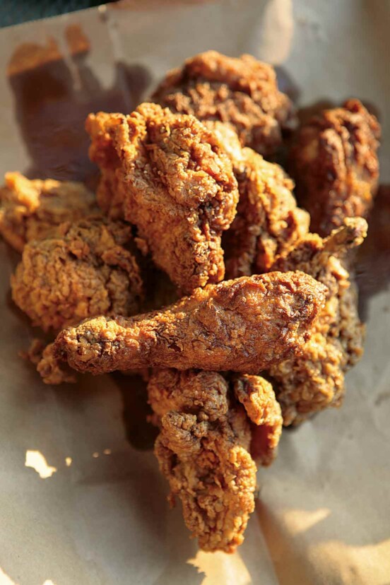 A pile of Cajun fried chicken pieces.