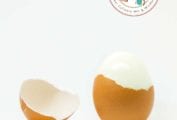 A partially peeled hard boiled egg to illustrate how to make easy-to-peel hard boiled eggs.