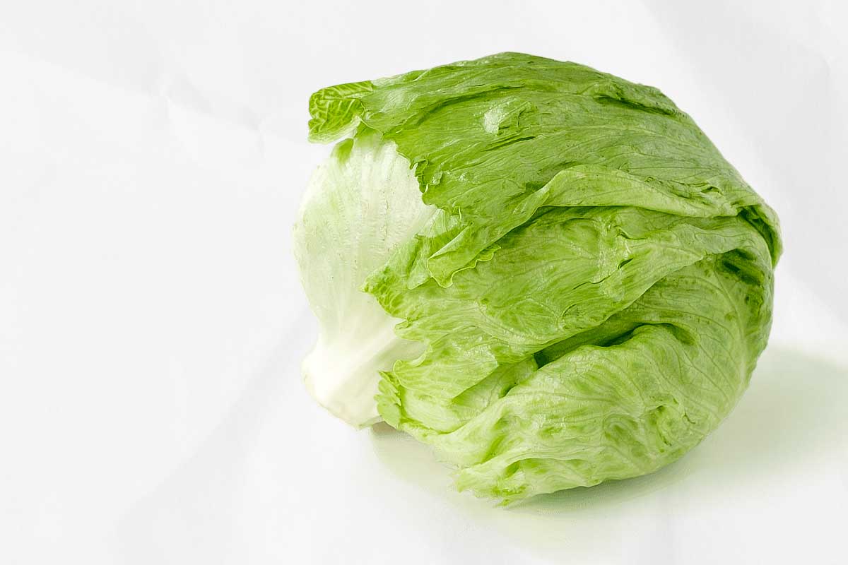 A head of iceberg lettuce, as illustration of how to choose the right salad greens for you.