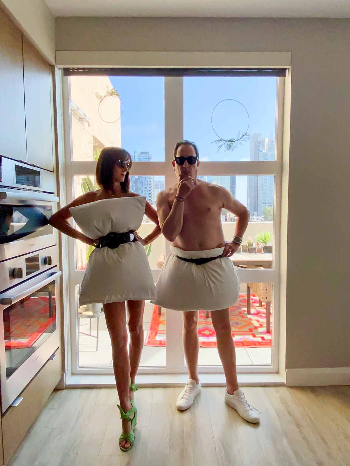 A photo of Sam the Cooking Guy and Kelly Zien wearing pillows for the podcast Talking With My Mouth Full, Ep. 38: Sam the Cooking Guy on Leftovers