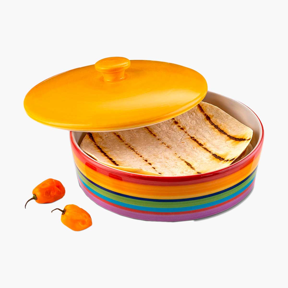A striped colorful tortilla warmer with peppers on the side, one of the items for everything you could possibly need for taco night at home.
