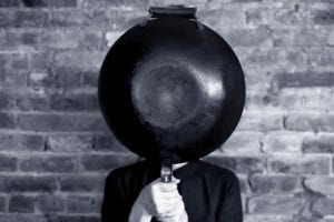 Grace Young behind a wok for the podcast Talking With my Mouth Full, Ep. 39: Everything Wok with Grace Young.