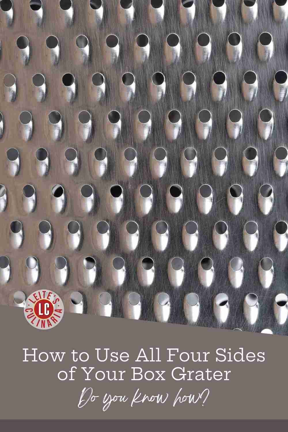 A side of a metal box grater.