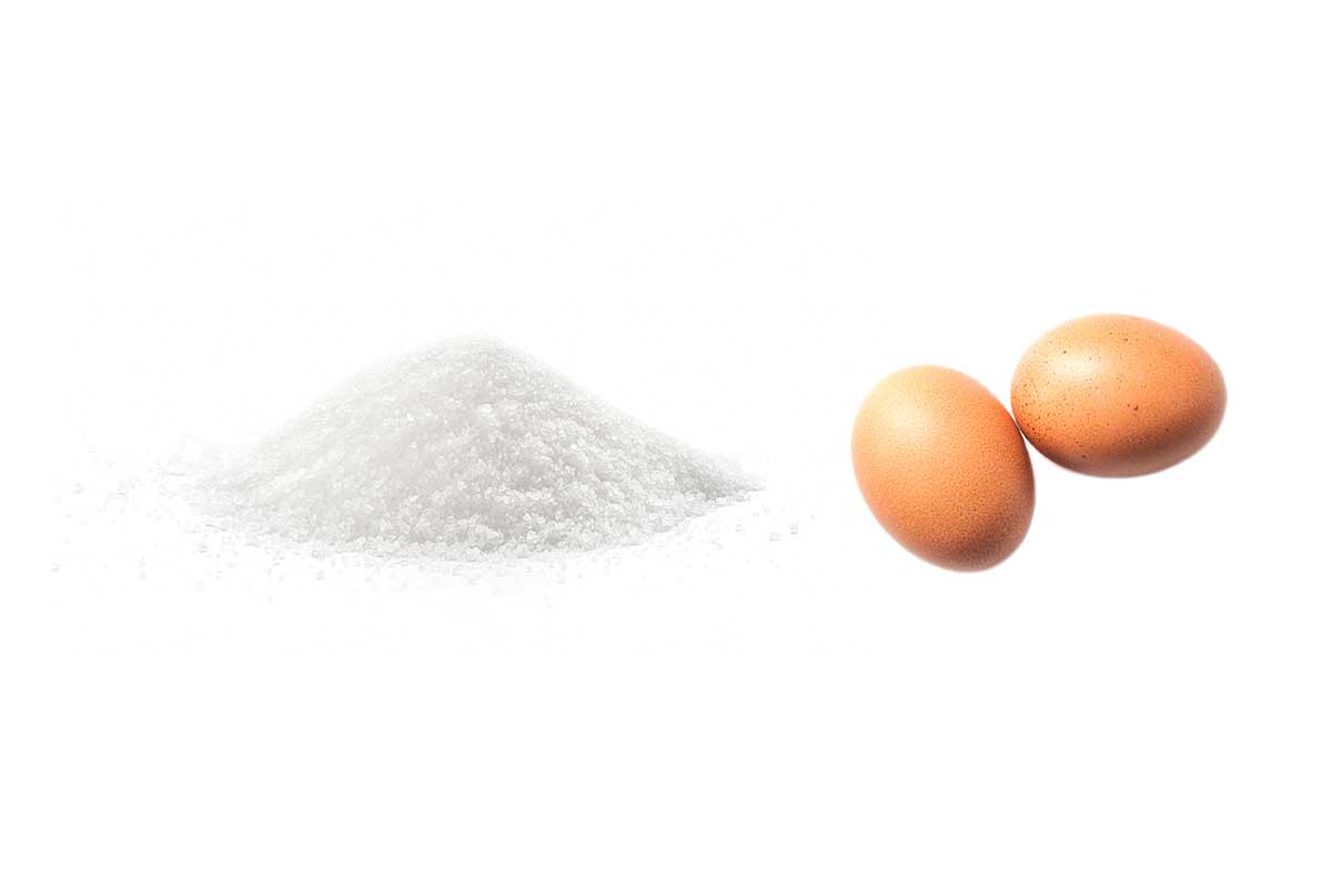 Eggs and sugar, the ingredients for French, Italian, and Swiss meringues.