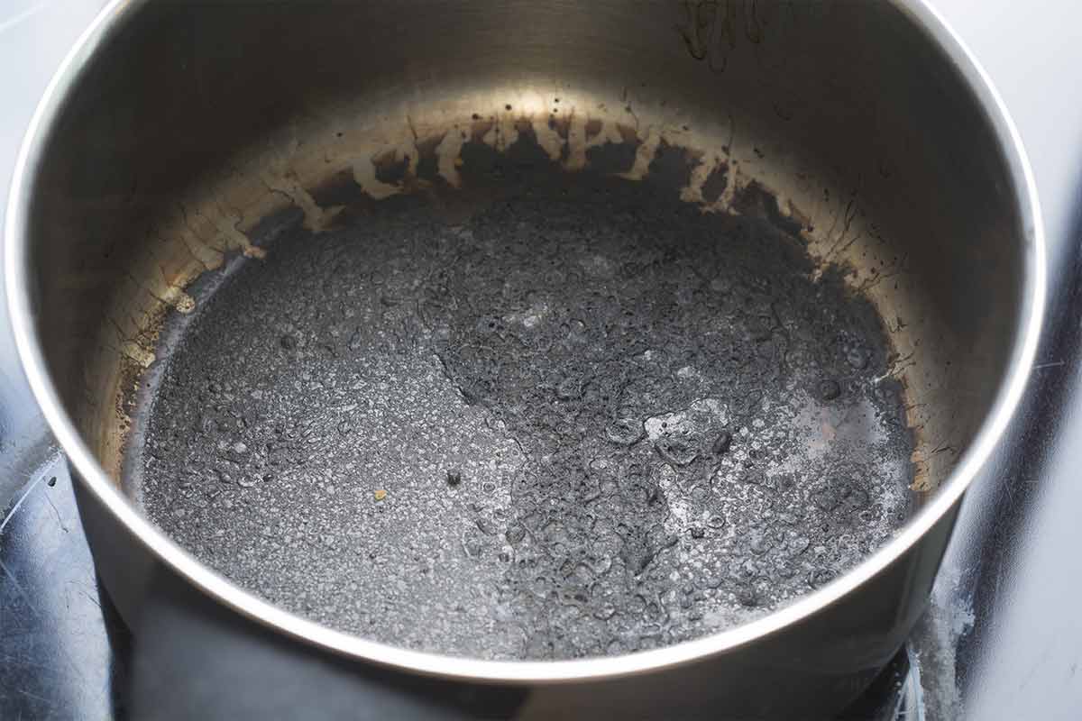 A burned pot from boiling grains dry.