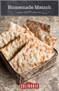 Sheets of homemade matzoh in a metal basket.