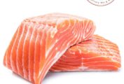 Two salmon fillets stacked on top of each other as illustration for the question 'how do I remove pesky fish pin bones?'