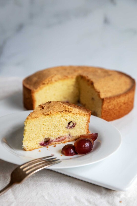 A slice of semolina-olive oil cake on a plate