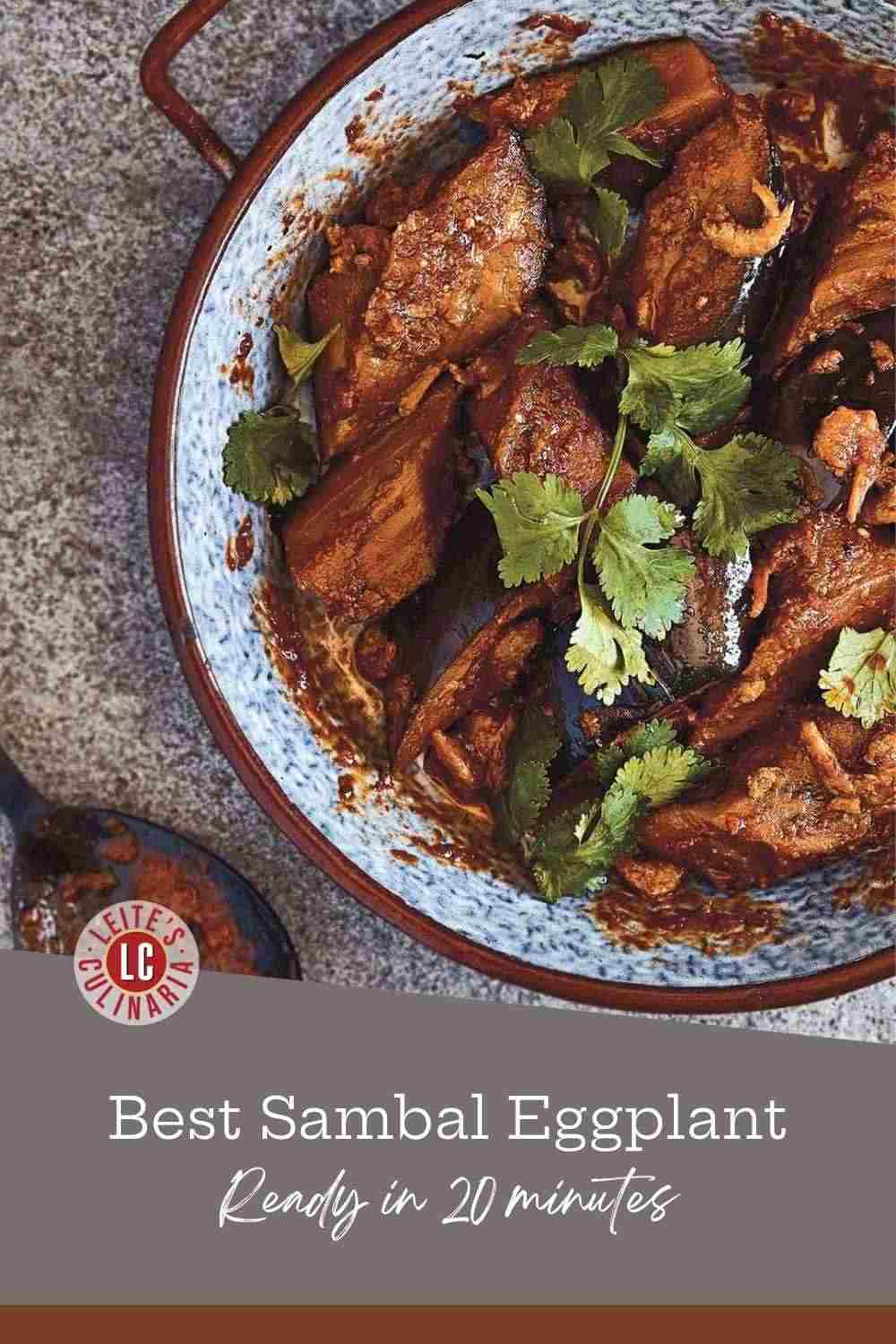 ender chunks of golden-brown eggplant coated in a rich, dark red sambal belacan sauce, garnished with fresh cilantro leaves.