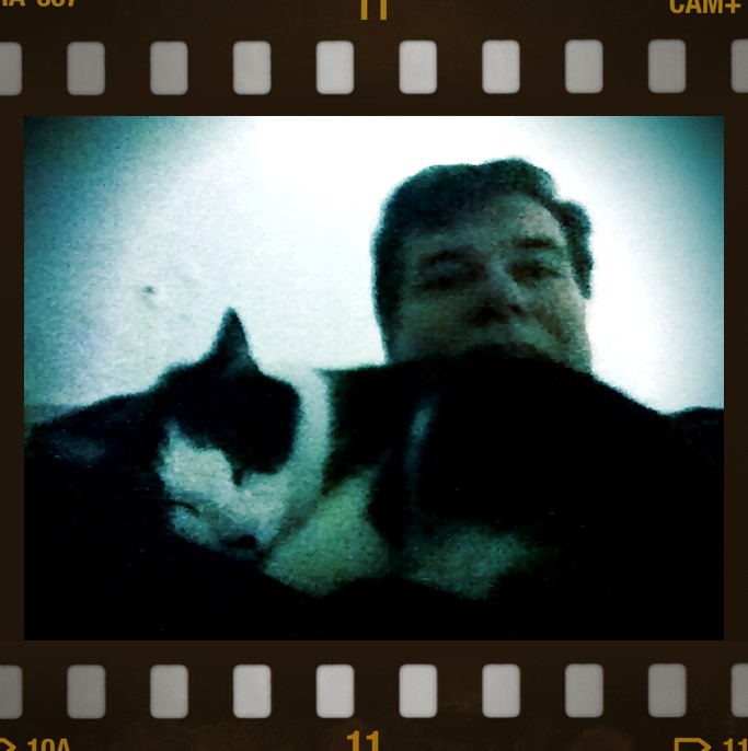 The first photo of David and his cat Rory, a.k.a. The Devil Cat.