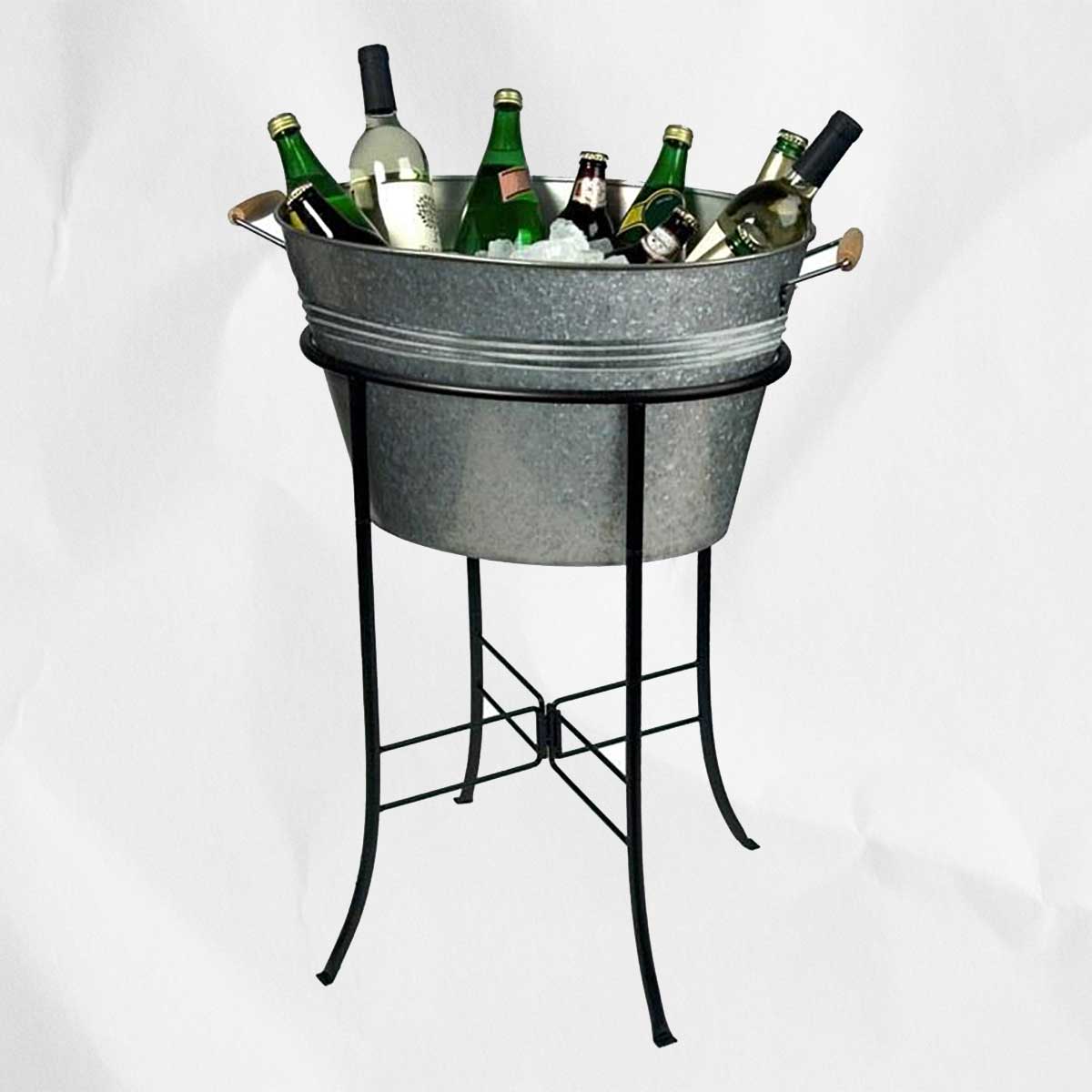 A metal beverage tub with wine, beer, and ice in it.