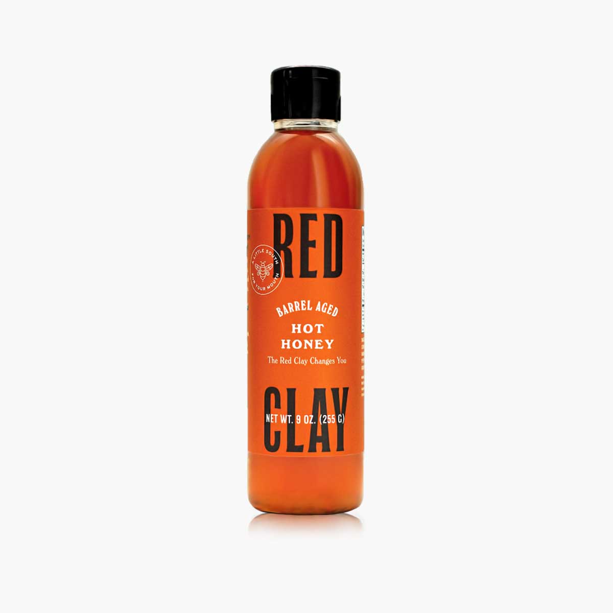 A bottle of Red Clay Hot Honey Sauce