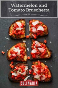 Three watermelon and tomato bruschetta slices topped with shaved pecorino and cut in half.