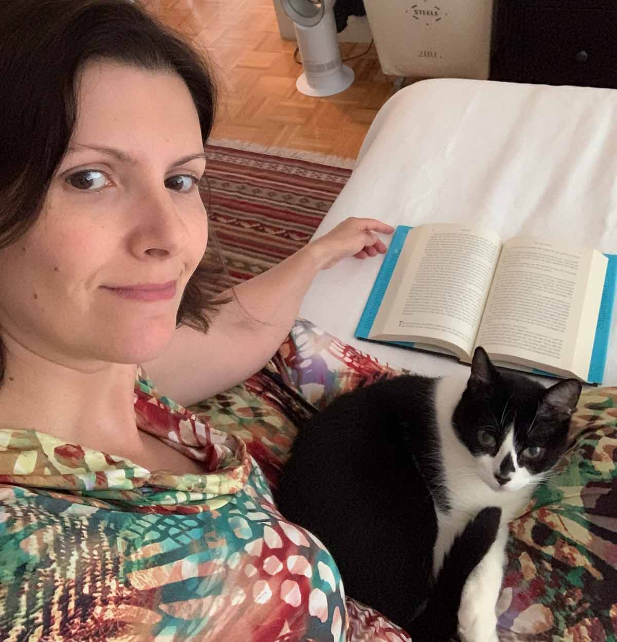 A weekend guest (and cat) reading