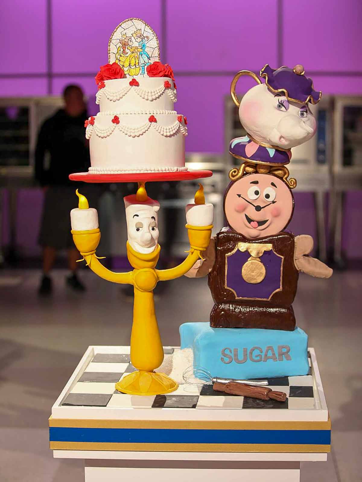 Characters from Beauty and the Beast made into a cake for a baking competition show