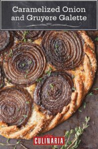 A caramelized onion and Gruyère galette with a rye crust and sprigs of thyme.
