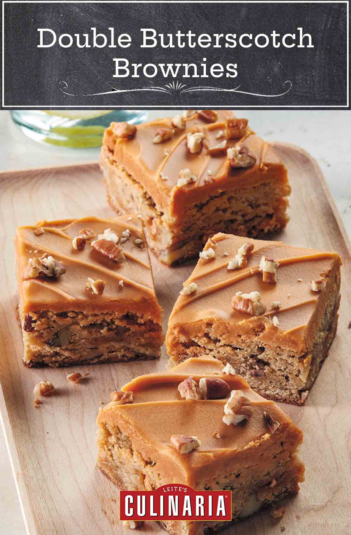 A wooden tray with 4 squares of double butterscotch blondies, with nuts sprinkled around them.