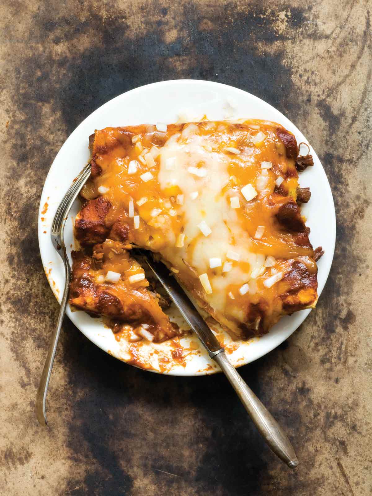 https://leitesculinaria.com/wp-content/uploads/2021/09/shredded-beef-enchiladas.jpg