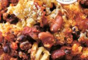 Chili mac and cheese in close up, with breadcrumbs and melted cheese.