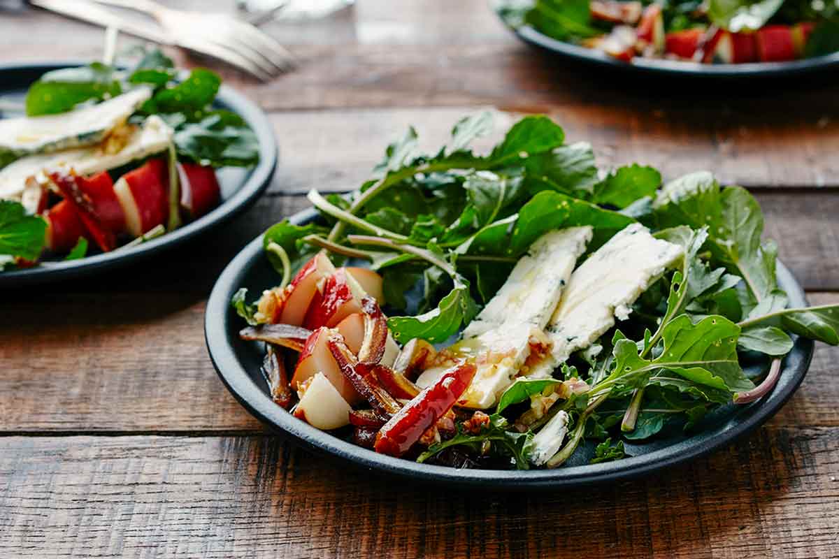 arugula salad with blue cheese dressing Arugula with Pomegranates, Blue Cheese and Pistachios