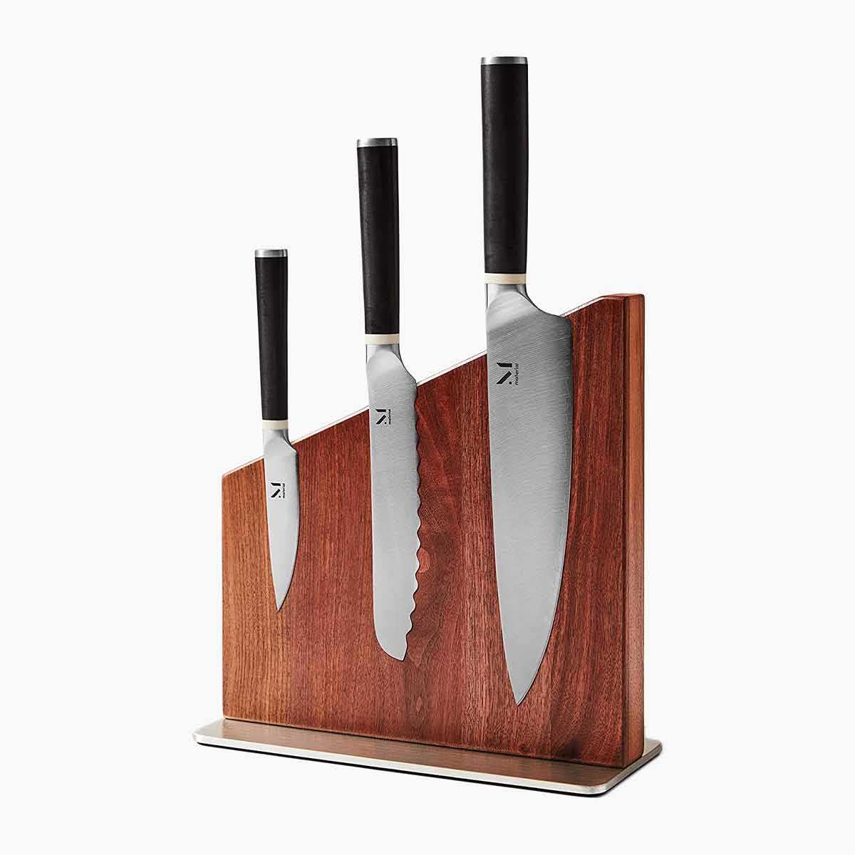 Three knives on a magnetic wooden block, one of Oprah's 12 favorite kitchen gifts for 2021.
