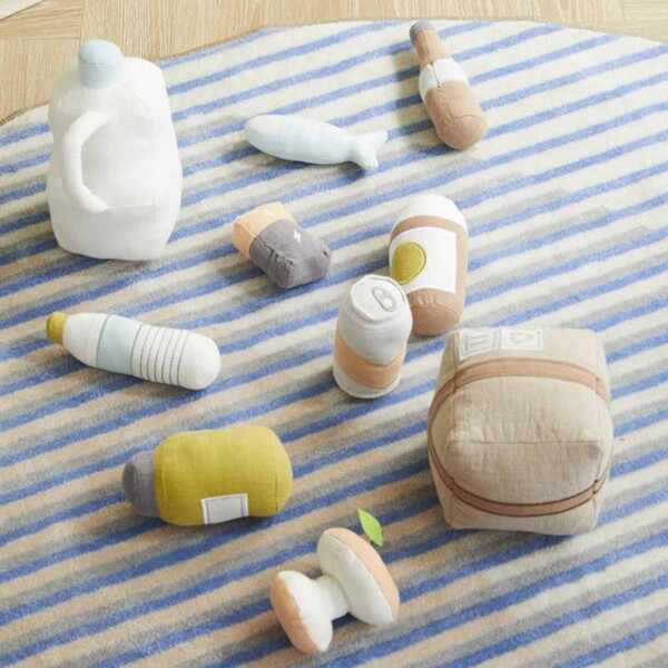 Plush Recycling Play Set for Kids on a striped rug.