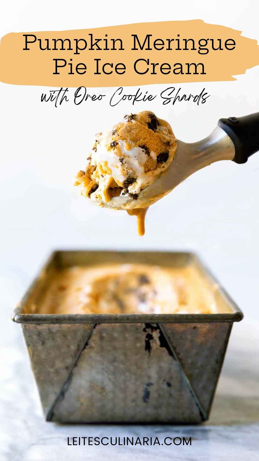 A container of Pumpkin Meringue Pie Ice Cream with a scoop.