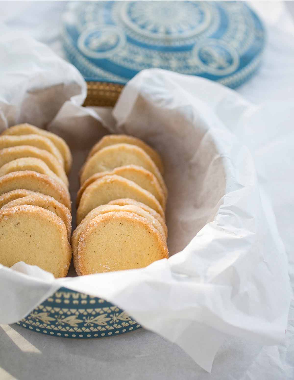 Vanilla bean sables in a lined basket