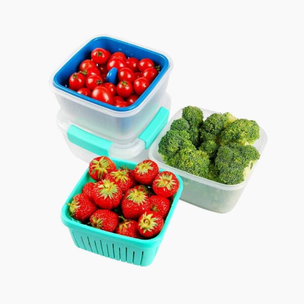 Berry Keeper filled with tomatoes, broccoli and strawberries.