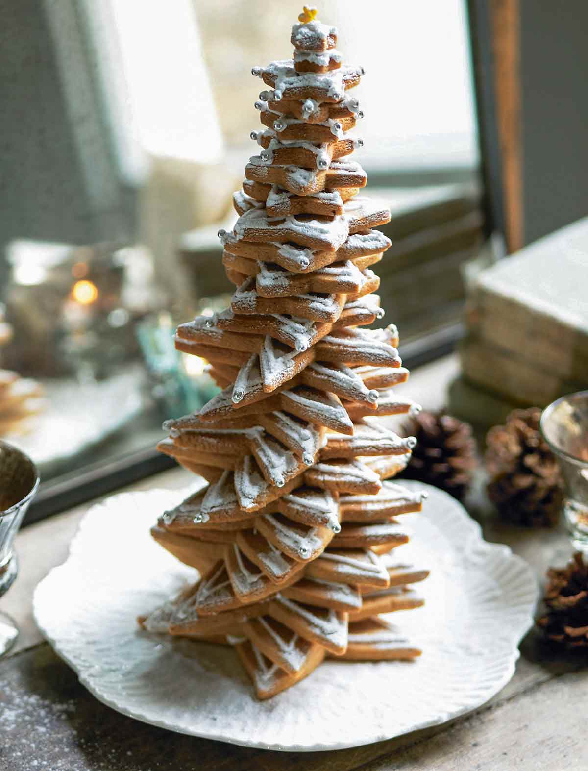 A Christmas tree made of decorated cookies.