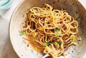 A bowl of spaghetti with anchovy and lemon