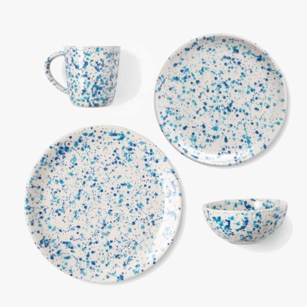 Blue and White Splatter Design Dinnerware Set 4 pieces laid out on white background.