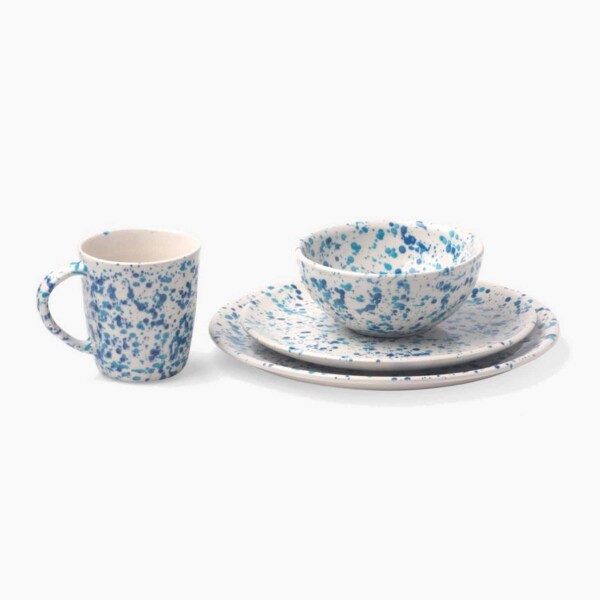 Blue and White Splatter Design Dinnerware Set mug two plates and a bowl.