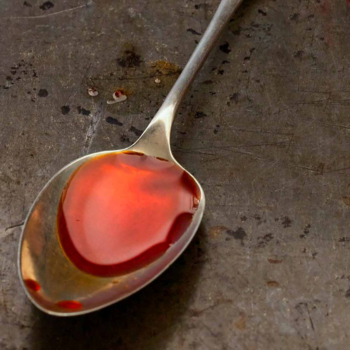 A spoon of Portuguese chouriço oil