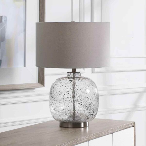 Storm Glass Table Lamp by Osvaldo Mendoza on a table.