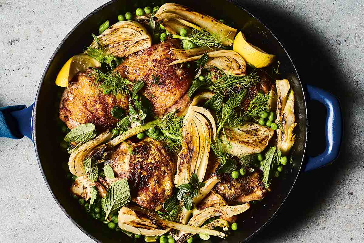 https://leitesculinaria.com/wp-content/uploads/2022/01/skillet-chicken-thighs-peas-fennel-fp.jpg