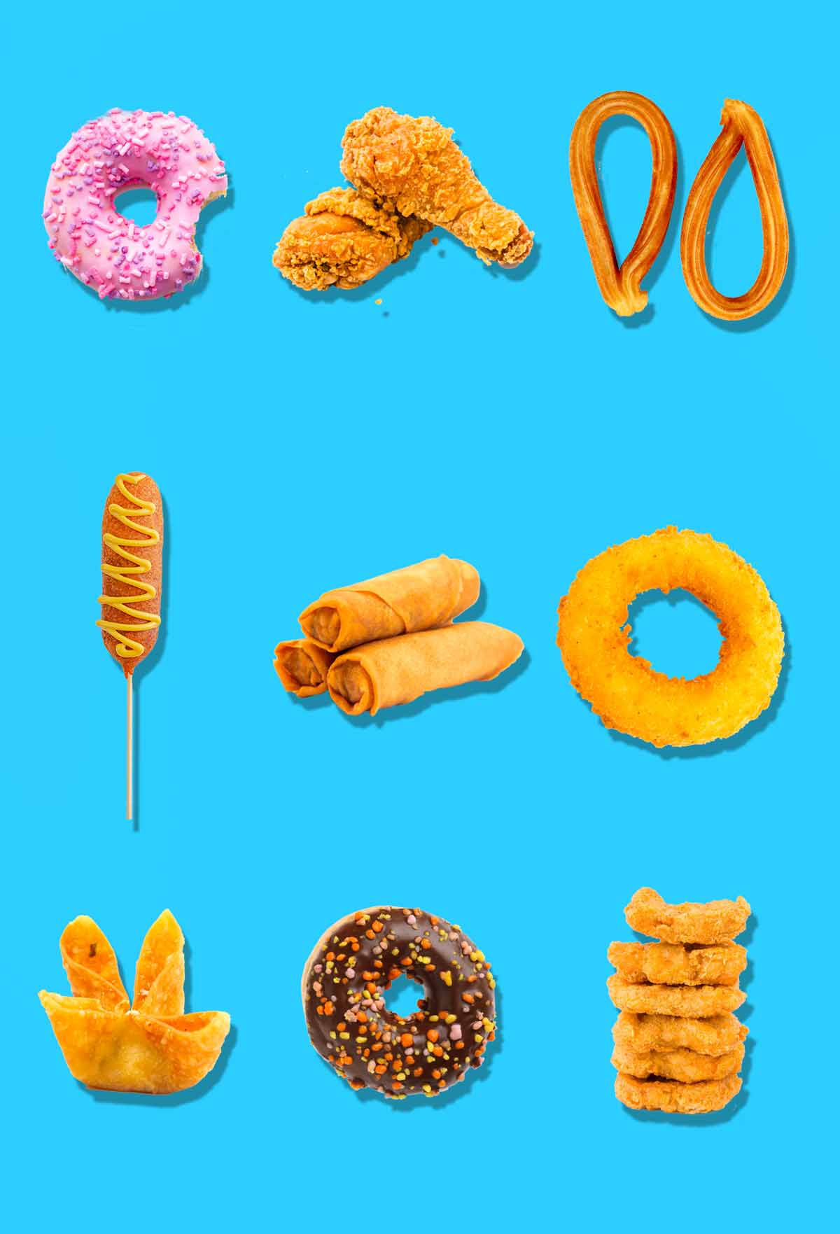 A collection of deep-fried foods including doughnuts, fried chicken, corn dogs, and onion rings.